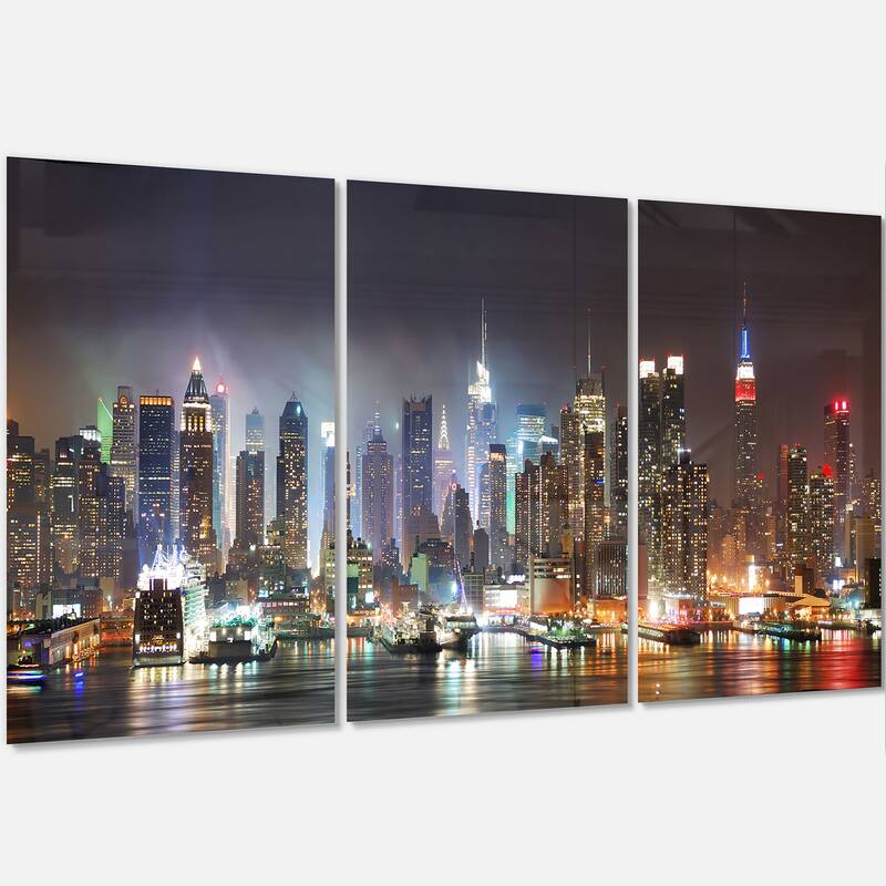 Designart 'Lit NYC Manhattan Skyline' Cityscape Photo Metal Wall Art