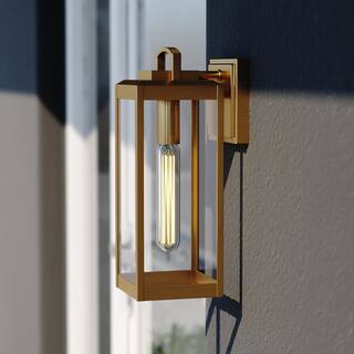 VAXCEL Kinzie 14.25 in. H 1-Light Vintage Brass Dusk to Dawn Sensor Gold Outdoor Wall Sconce, Steel, Clear Glass Shade