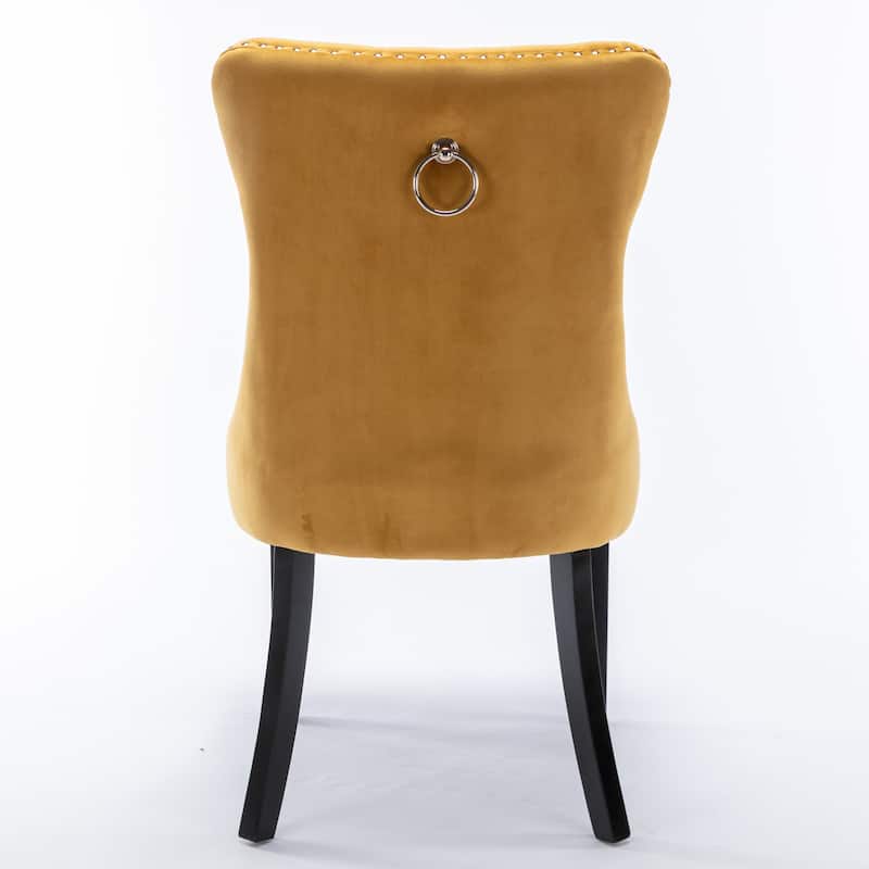 Contemporary Velvet Upholstered Dining Chair with Solid Wood Legs and Nailhead Trim, Offering Luxurious Comfort and Style.