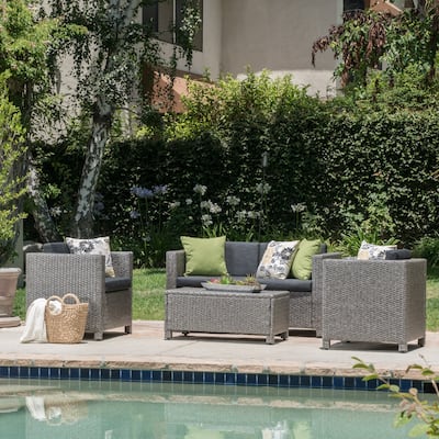 Roomfitters 4-Piece Outdoor Wicker Patio Furniture Set with Cushions and Coffee Table, All-Weather Rattan Sofa Set