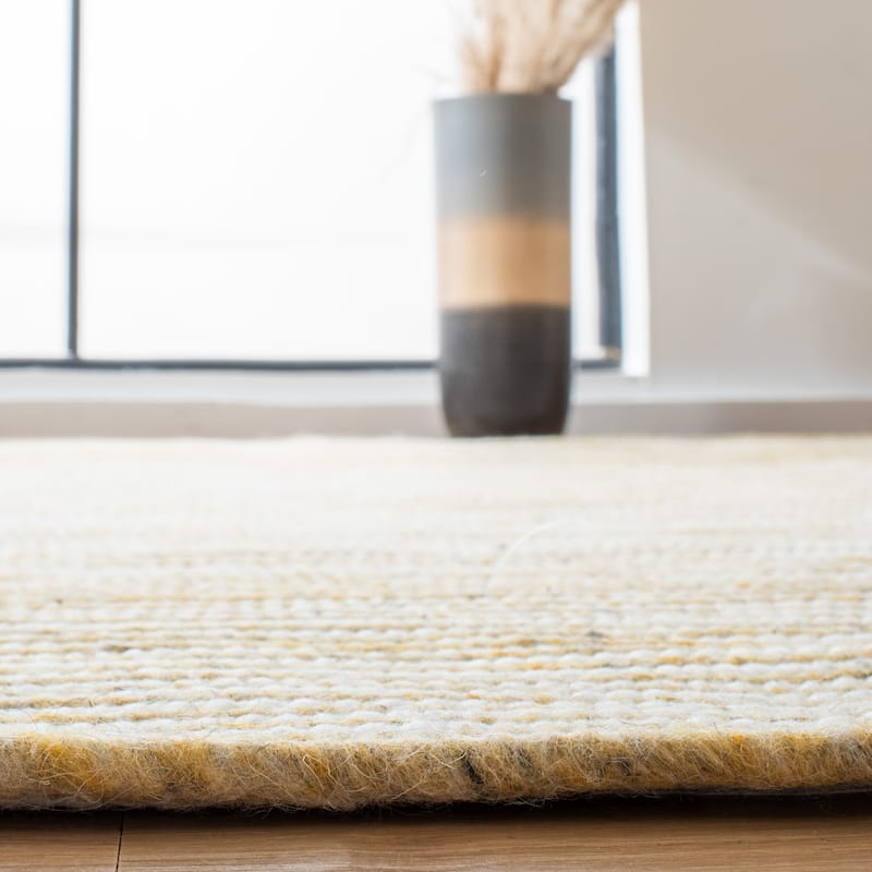 SAFAVIEH, Handmade Braided Bahrie Wool Rug