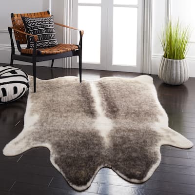SAFAVIEH Faux Cow Hide Ngan Animal Rug