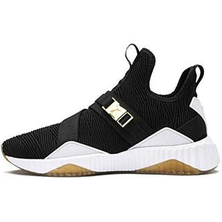 puma defy mid black and gold