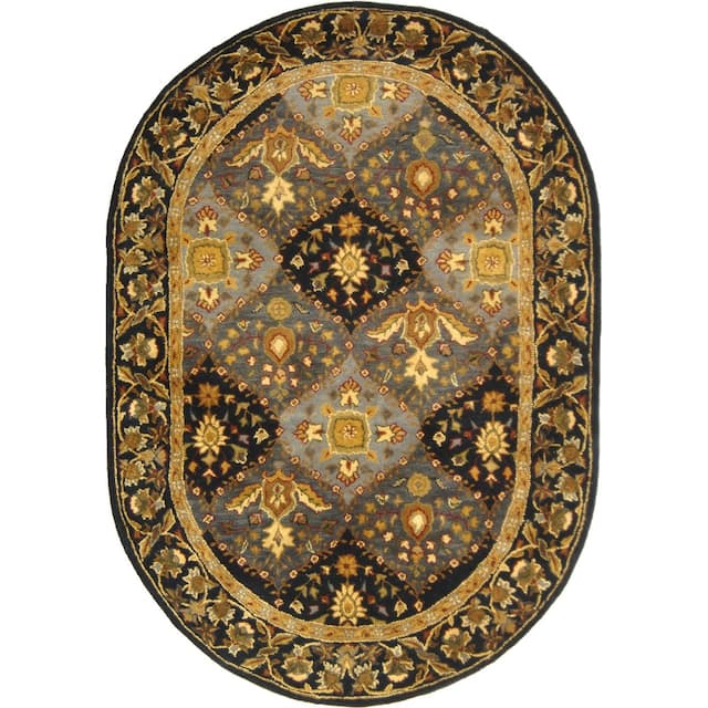 SAFAVIEH Handmade Antiquity Philomena Traditional Oriental Wool Rug - 7'6" x 9'6" Oval - Blue