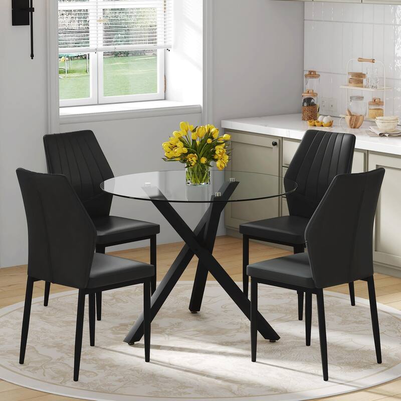 Table and chair set.Modern glass round table: X-shaped black metal bracket. Paired with 4 Dining Chairs