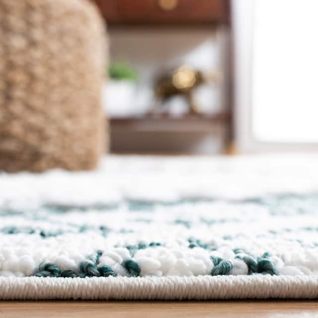 SAFAVIEH Moroccan Tassel Shag Iulieana Boho Tribal 2-inch Thick Rug