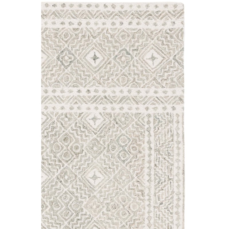 SAFAVIEH Handmade Micro-Loop Lutetia Wool Rug