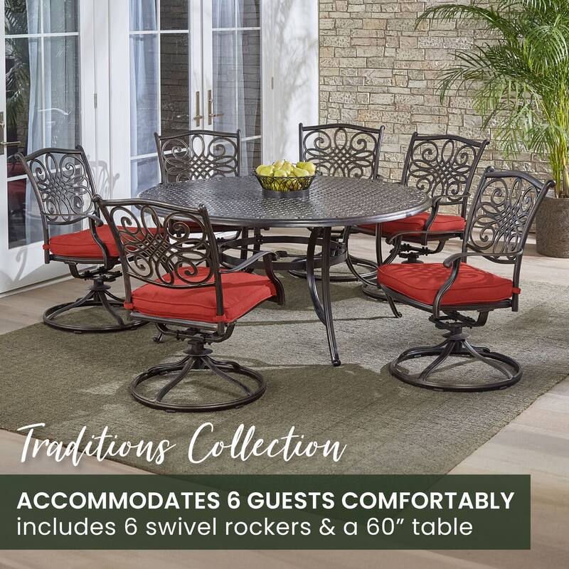 Hanover Traditions 7-Piece Dining Set in Red with a 60 In. Round Cast-top Table and Six Swivel Rockers