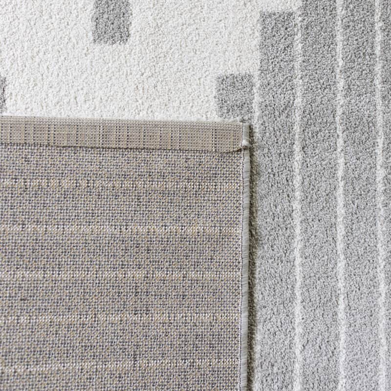 Carson Carrington Salsaker Geometric Area Rug