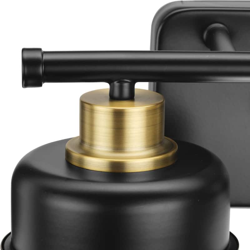 Beckner Collection Two-Light Matte Black Clear Glass Urban Industrial Bath Light with Vintage Brass Accents