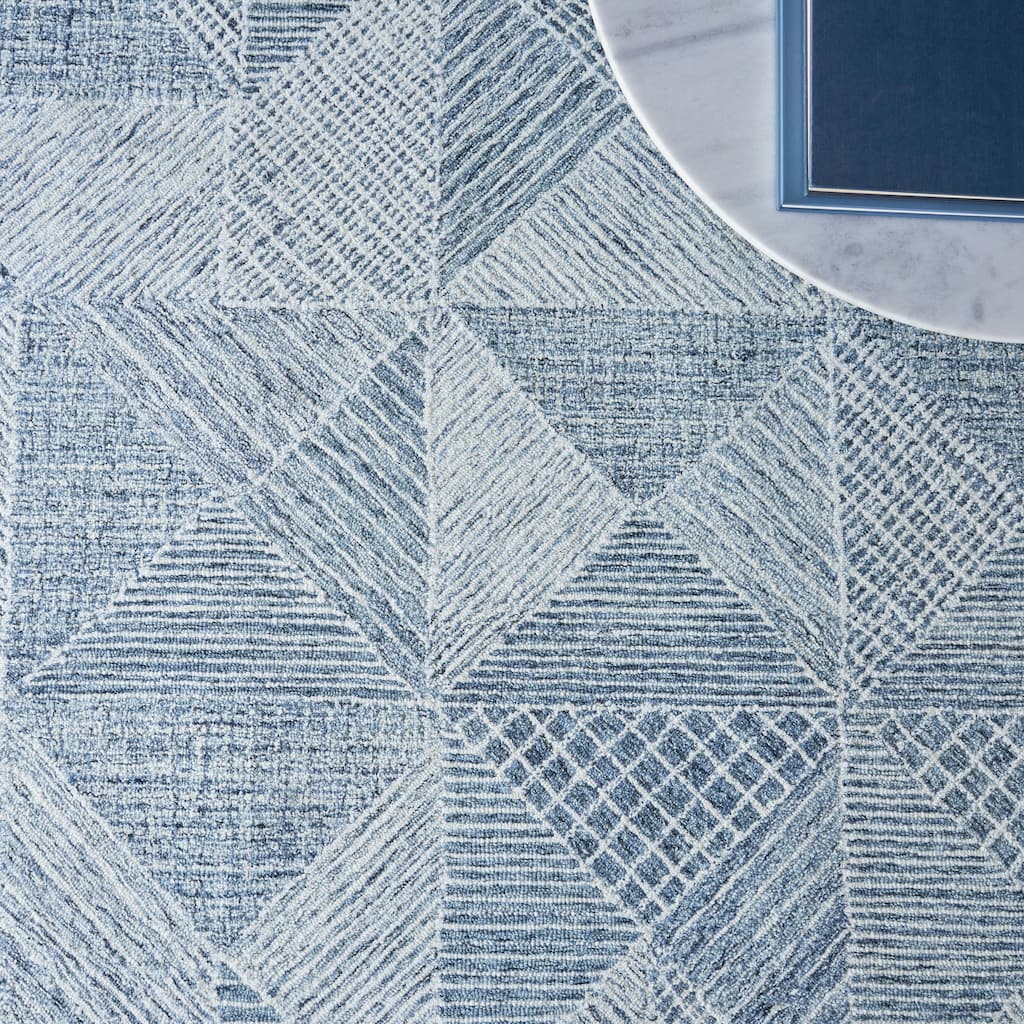 EXQUISITE RUGS Caprice Hand-tufted New Zealand Wool Silver Area Rug.
