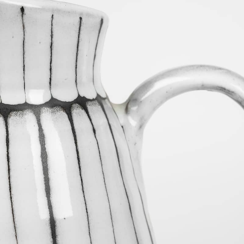 HomeRoots 10" Black And White Cylinder Ceramic Urns Jars - 6.9"W x 9.1"D x 13.4"H - White/Black