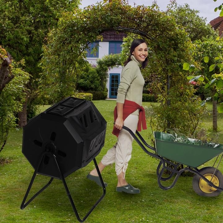 https://ak1.ostkcdn.com/images/products/is/images/direct/0b48184dafd1320715e4938f46d5adc966e8ab96/Dual-Tumbling-Composter-42-Gallon-Tumbler-Composting-Bins-Easy-Turn-System-Rotating-Barrel-With-Two-Sliding-Doors.jpg