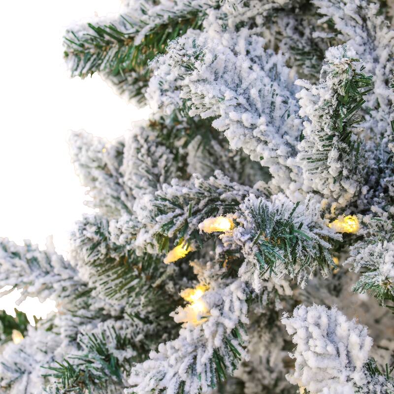 National Tree Company 9 ft. Snowy Hudson Hinged Tree with 1200 Dual Color LED Lights - 9 Foot