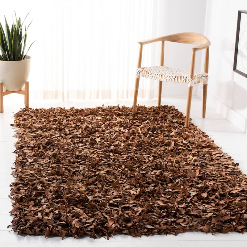SAFAVIEH Handmade Leather Shag Carlijn Modern Leather Rug