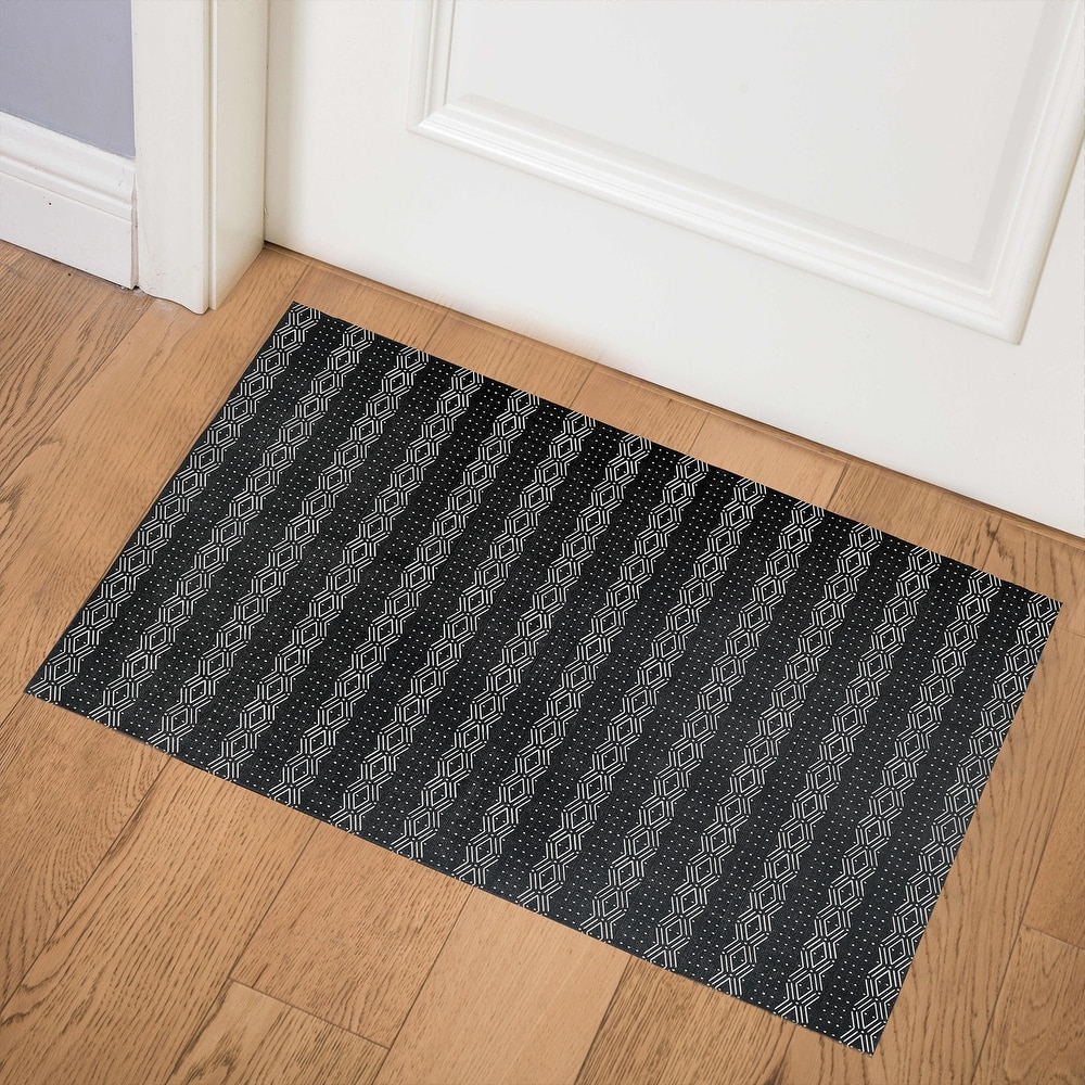 https://ak1.ostkcdn.com/images/products/is/images/direct/0b97ce43e23a785bbd46813fb5aa8514830e2ec6/DUNE-BLACK-Indoor-Floor-Mat-By-Kavka-Designs.jpg