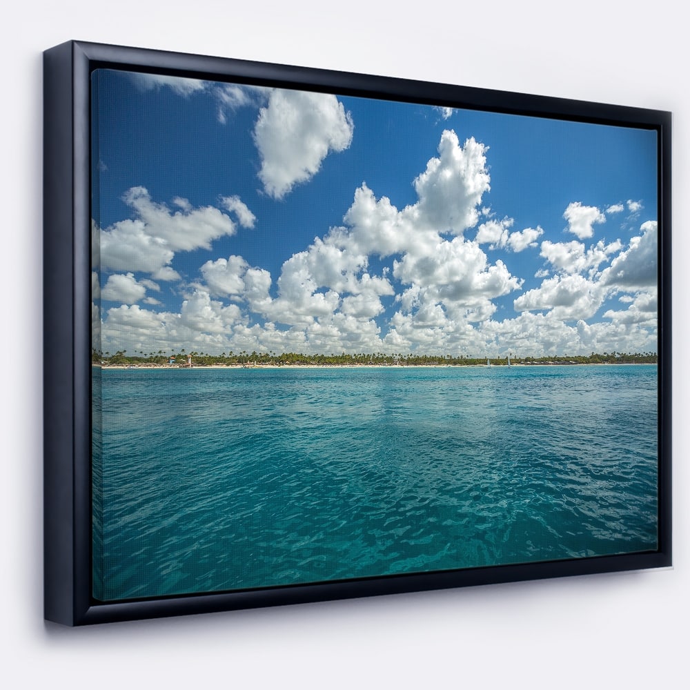 Designart "White Fluffy Clouds Over Sea" Oversized Beach Framed Canvas Artwork Print