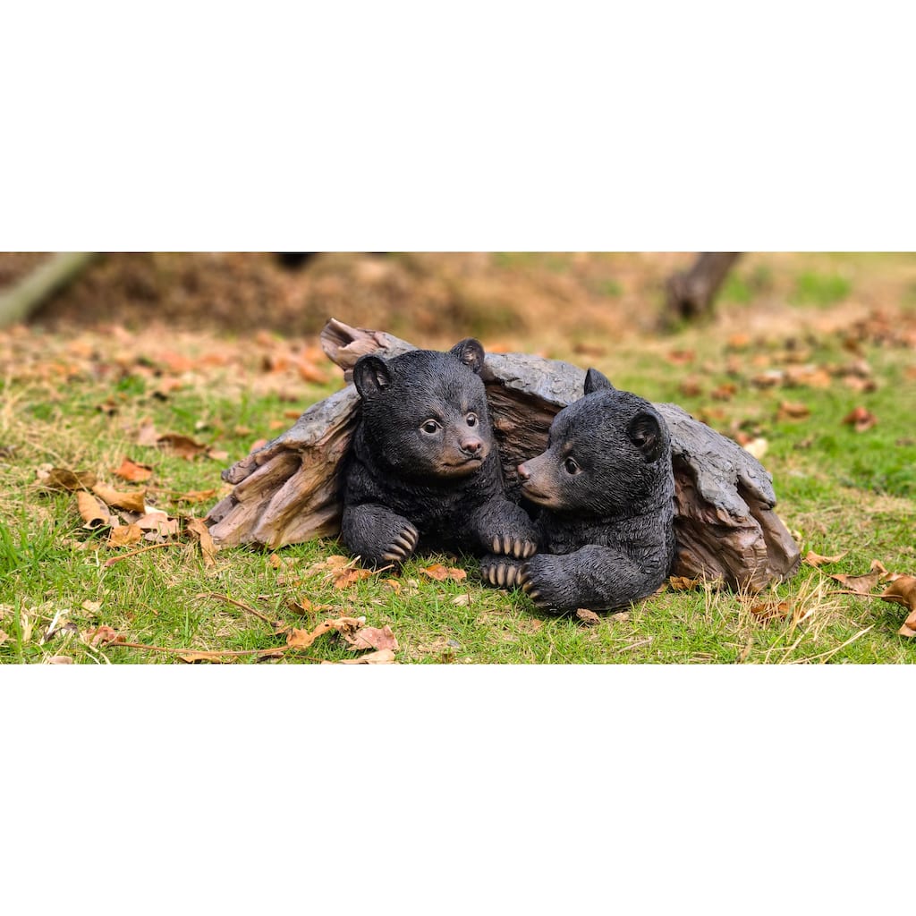 Black Bear Cubs Hiding Under Log Statue