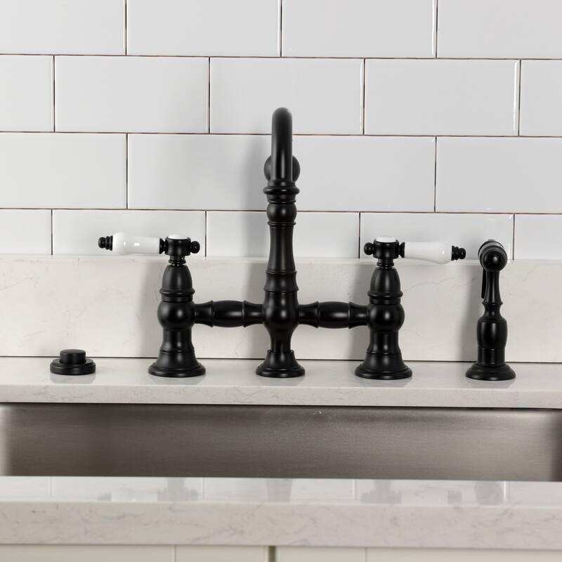Kingston Brass Bel-Air Two-Handle 4-Hole Deck Mount Bridge Kitchen Faucet with Brass Side Sprayer