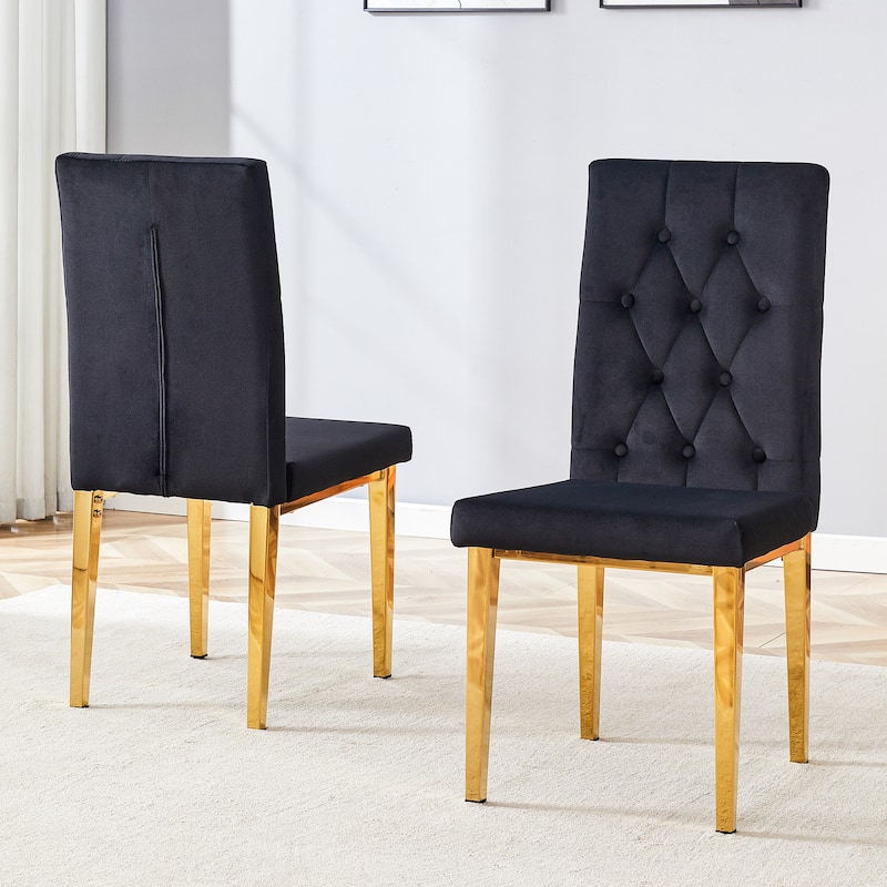 2 piece dining chairs.The gold metal legs complement the black velvet,showcasing a perfect blend
