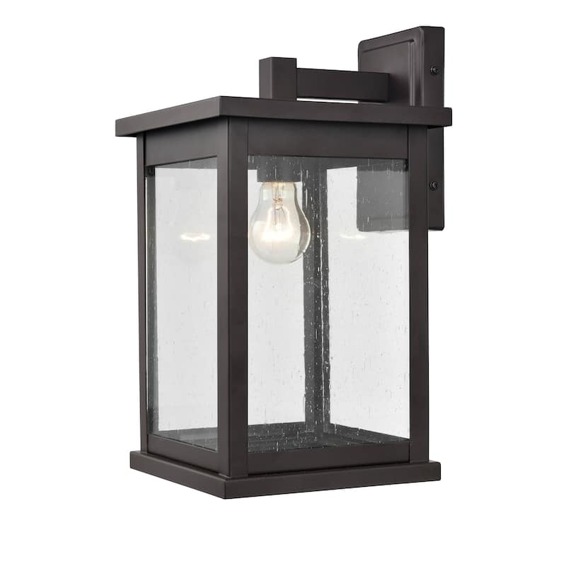 Millennium Lighting Bowton 1 Light Outdoor Wall Sconce in Powder Coat Bronze with a Clear Glass Shade