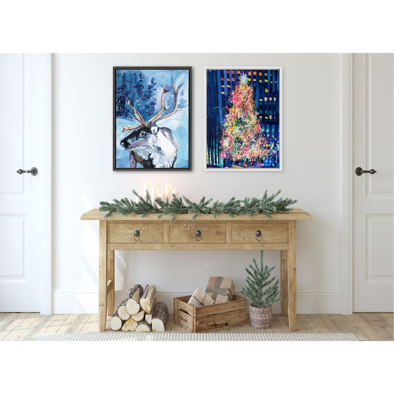 Kate and Laurel Sylvie Reindeer In Snow Framed Canvas by Rachel Christopoulos
