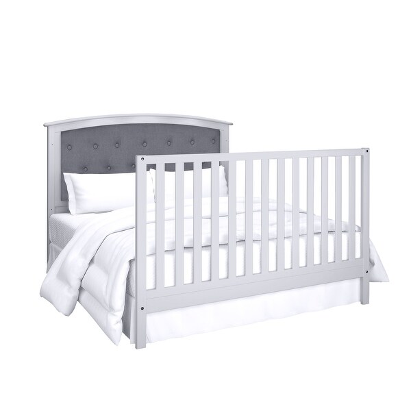 grey tufted crib