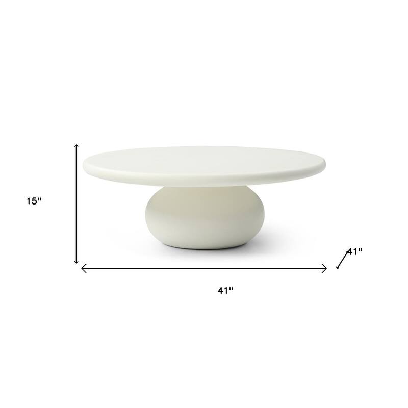 HomeRoots 41" Beige Glass Round Pedestal Coffee Table - 41.00 in. x 15.00 in. x 41.00 in.