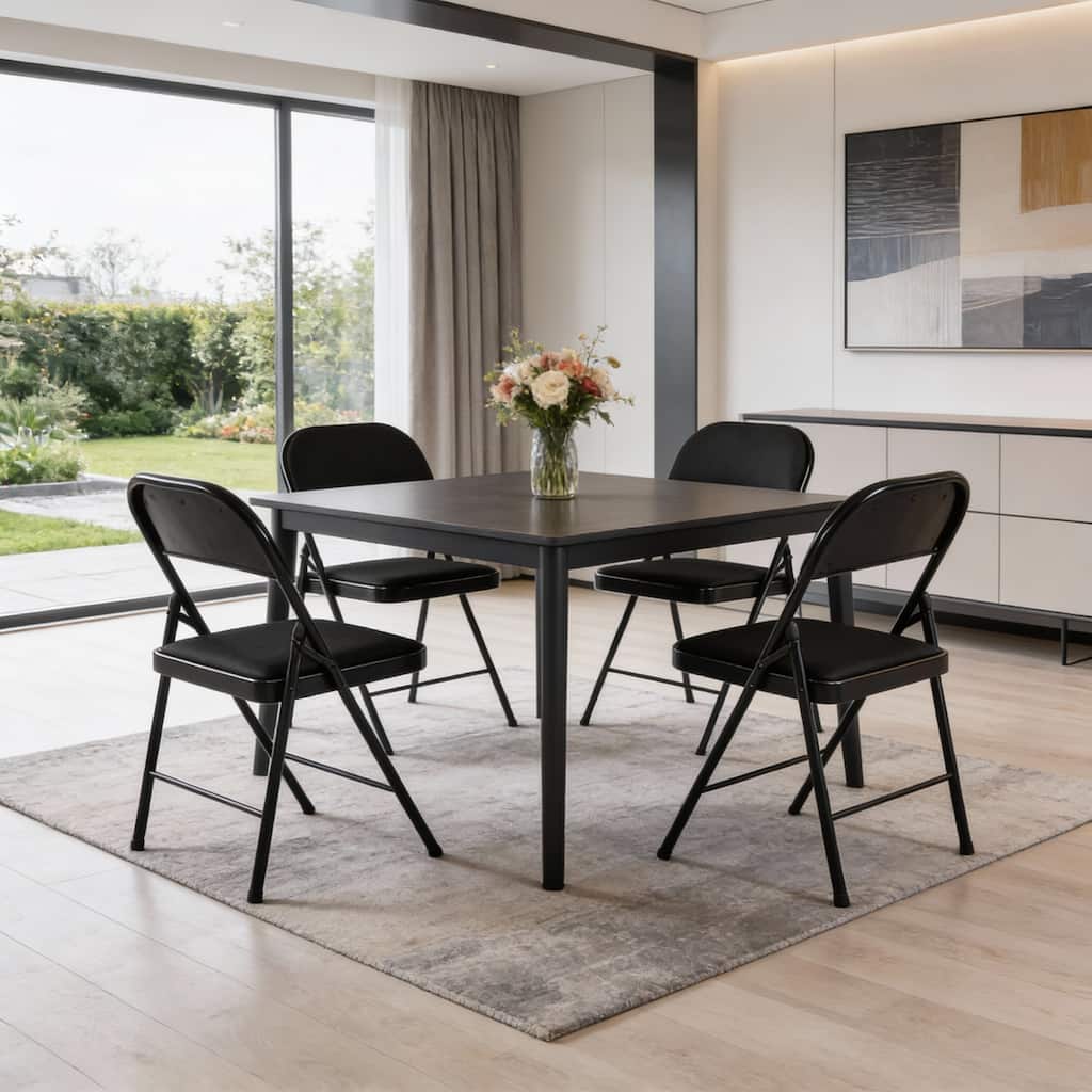 HomeRoots Set of Four Black Faux Leather and Steel Folding Chairs - 17.70 in. x 37.70 in. x 15.70 in.