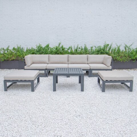 LeisureMod Chelsea 7-Piece Patio Ottoman Sectional With Coffee Table