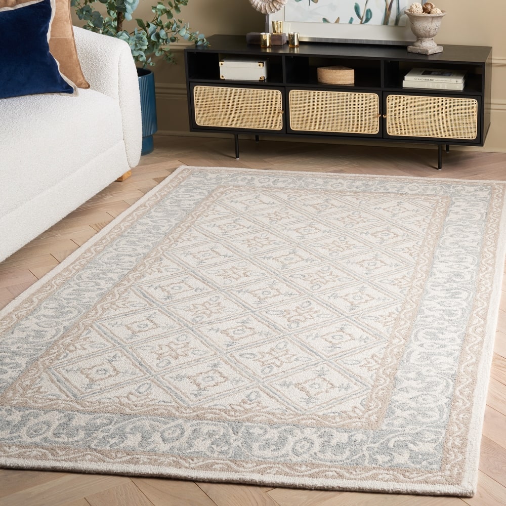 SAFAVIEH Handmade Ebony Tulun Wool Rug