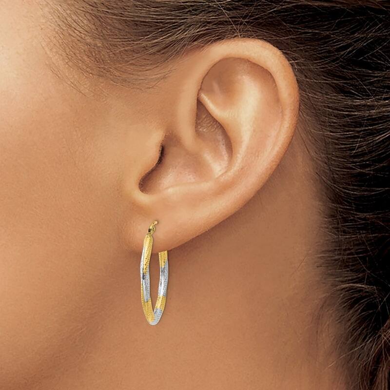 Curata 14k Yellow Gold and Rhodium 3x25mm Textured Oval Hoop Earrings