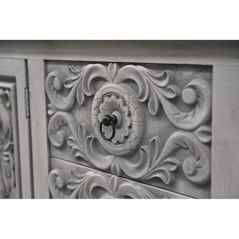 HomeRoots 106" Gray Distressed Solid Wood Carved Floral Three Drawer Sideboard with Four Doors