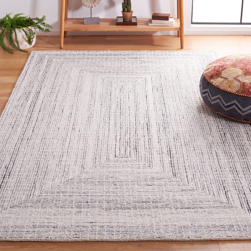 SAFAVIEH Handmade Abstract Maggy Modern Wool Rug - 9' x 12' - Black/Ivory