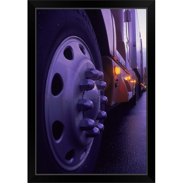 "Close-up of truck wheels" Black Framed Print