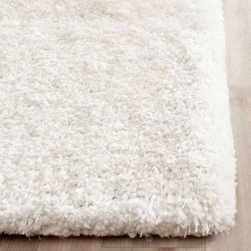 SAFAVIEH Handmade South Beach Leonella Shag Solid Polyester Rug