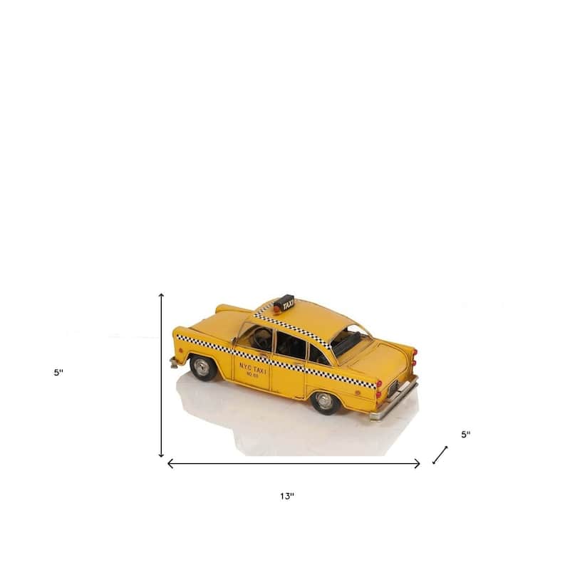 HomeRoots 13" Yellow Metal Hand Painted NYC Taxi Tabletop Sculpture