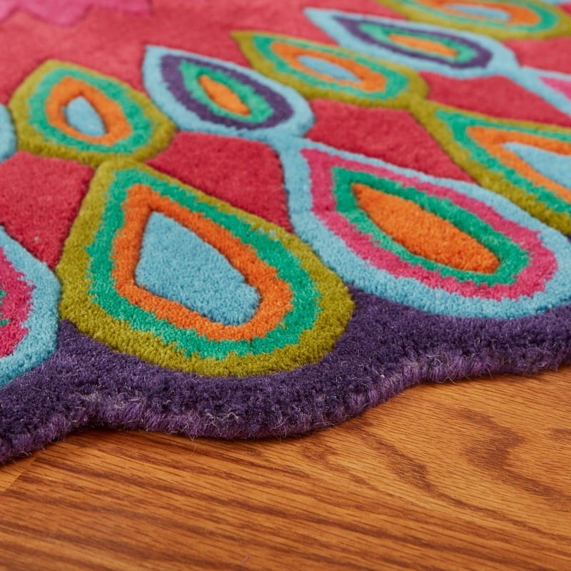 Sevita Bursting Peacock Wool Area Rug