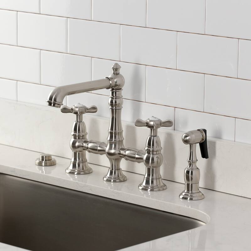 Kingston Brass Essex Two-Handle 4-Hole Deck Mount Bridge Kitchen Faucet with Brass Side Sprayer