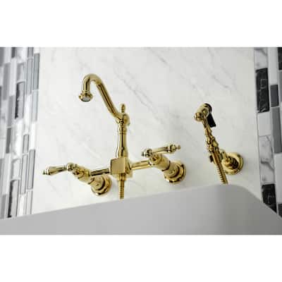 Kingston Brass Heritage Wall Mount Bridge Kitchen Faucet with Brass Sprayer