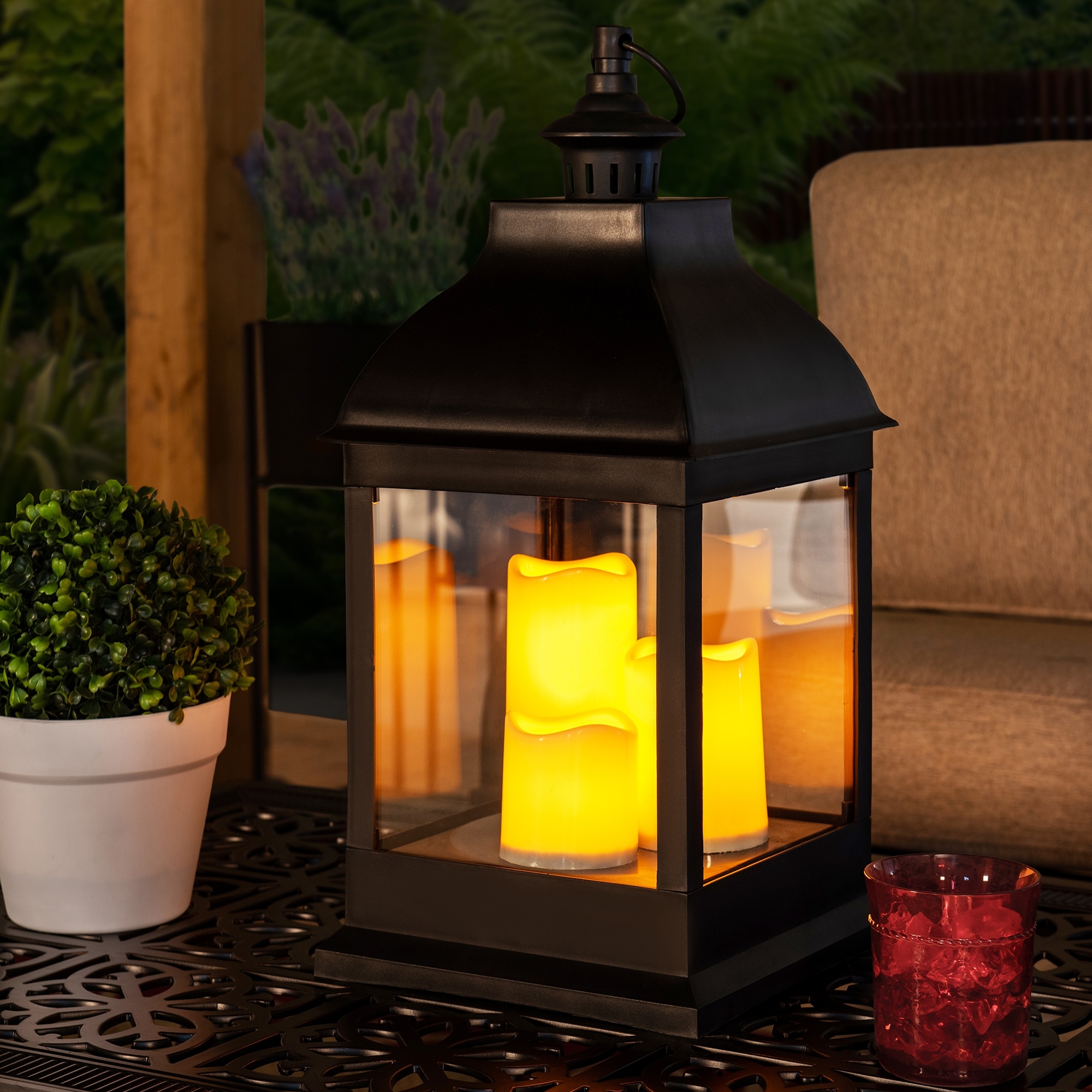 https://ak1.ostkcdn.com/images/products/is/images/direct/0de8f27916a0b179add9364bfb44a96a7d40d4c0/Sunjoy-20%22-LED-Battery-Powered-Lantern%2C-Outdoor-Patio-Decorative-Light%2C-Waterproof-Hanging-Lantern-with-3-Flameless-Candles.jpg