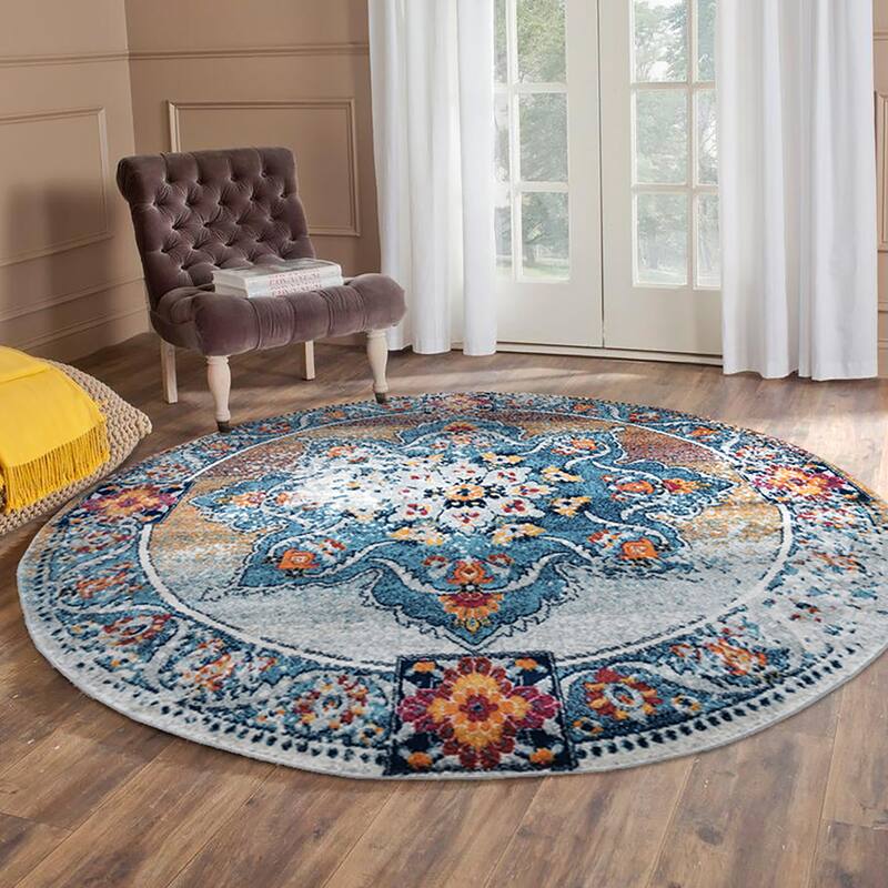 Aurelia Mata Orange Bordered Area Rug