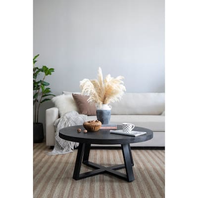 Charming Round Coffee Table with Modern Cross-Legged Frame for Stylish Spaces