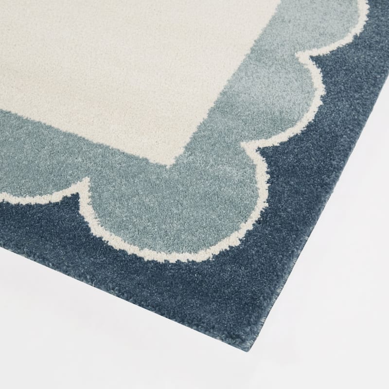 Caldeira Scalloped Border Area Rug