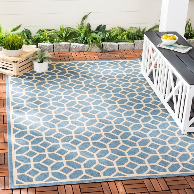 SAFAVIEH Beach House Annemari Indoor/ Outdoor Waterproof Patio Backyard Rug - 6'7" x 9'2" - Blue/Creme