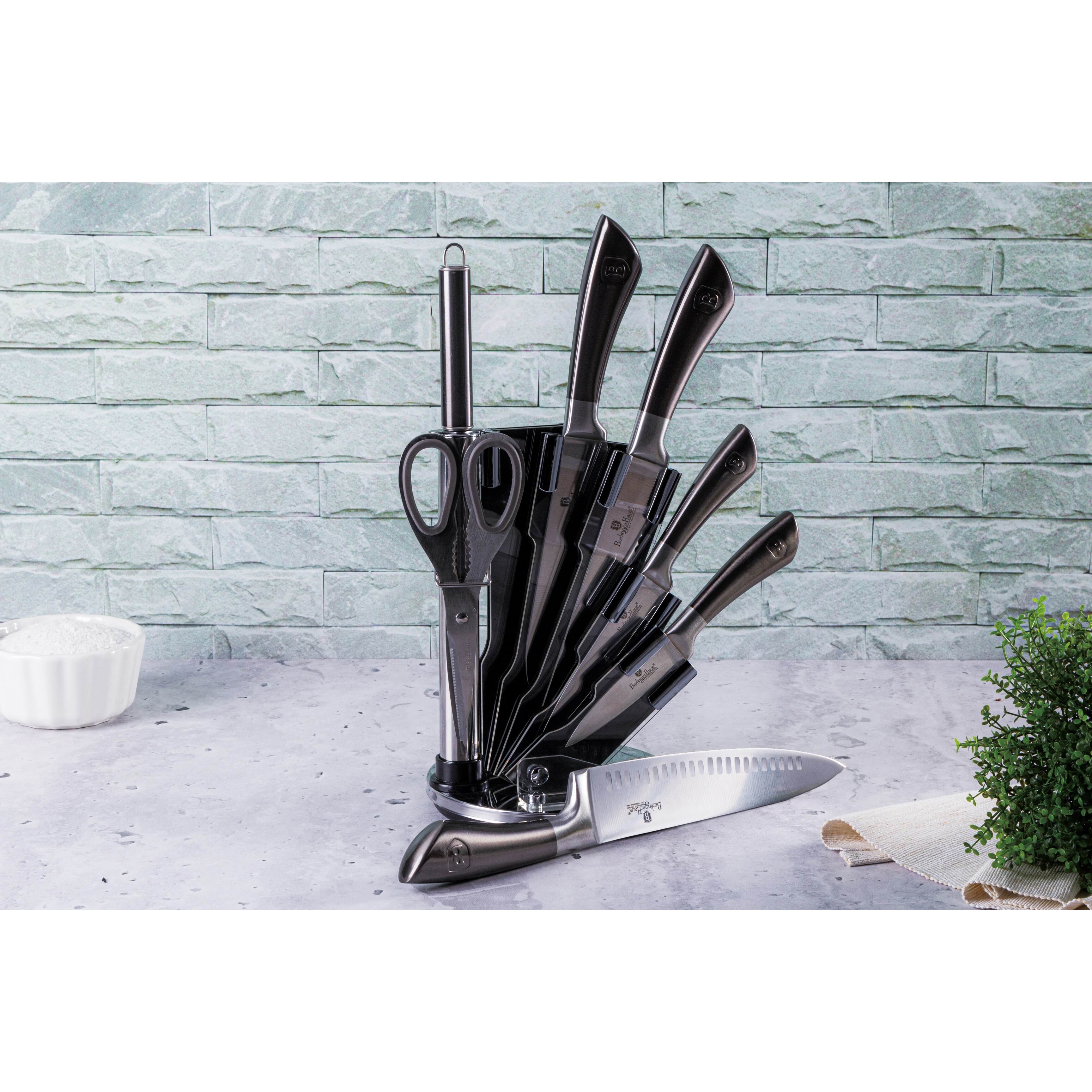 https://ak1.ostkcdn.com/images/products/is/images/direct/0e3a58c3ff17774e648f07141a64b866367d73fa/8-Piece-Knife-Set-w--Acrylic-Stand%2C-Carbon-Collection.jpg