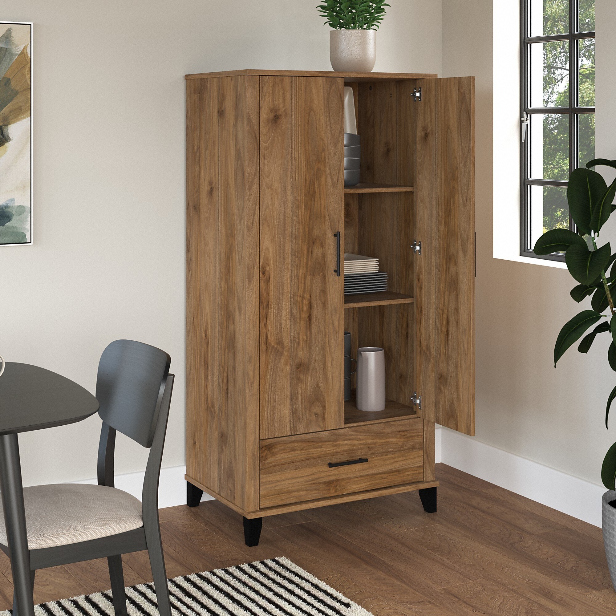 https://ak1.ostkcdn.com/images/products/is/images/direct/0e3da5a30722fdd677cd62f521c7c02c8d3c691b/Somerset-Tall-Kitchen-Pantry-Cabinet-with-Drawer-by-Bush-Furniture.jpg