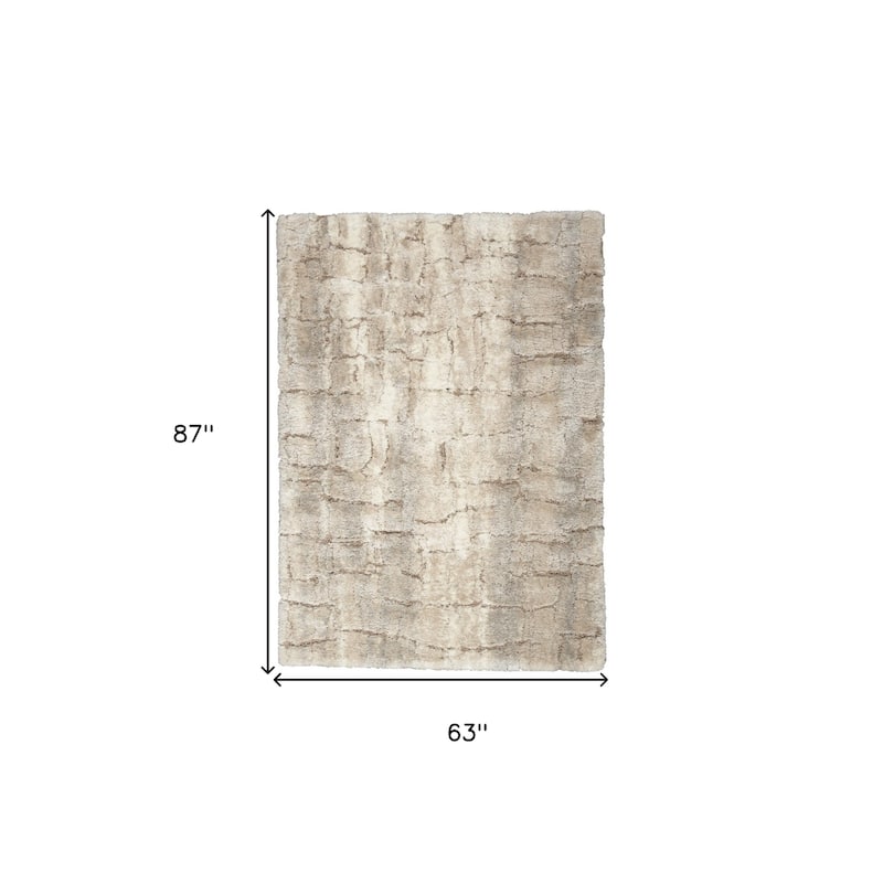 Power Loomed Abstract Stain Resistant Soft Area Rug - 87' X '63' X '1.58