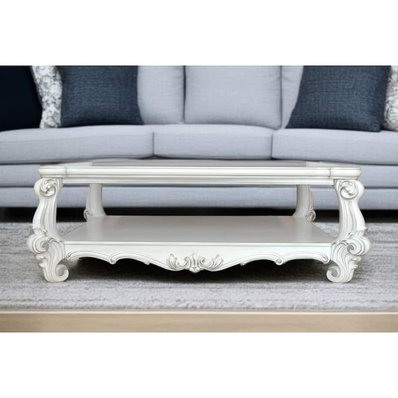 HomeRoots 57" White Wood Ornate Coffee Table With Shelf - 57' X '21' X '41 - White