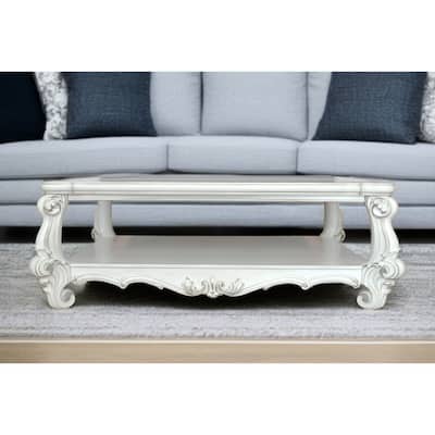 HomeRoots 57" White Wood Ornate Coffee Table With Shelf - 57' X '21' X '41